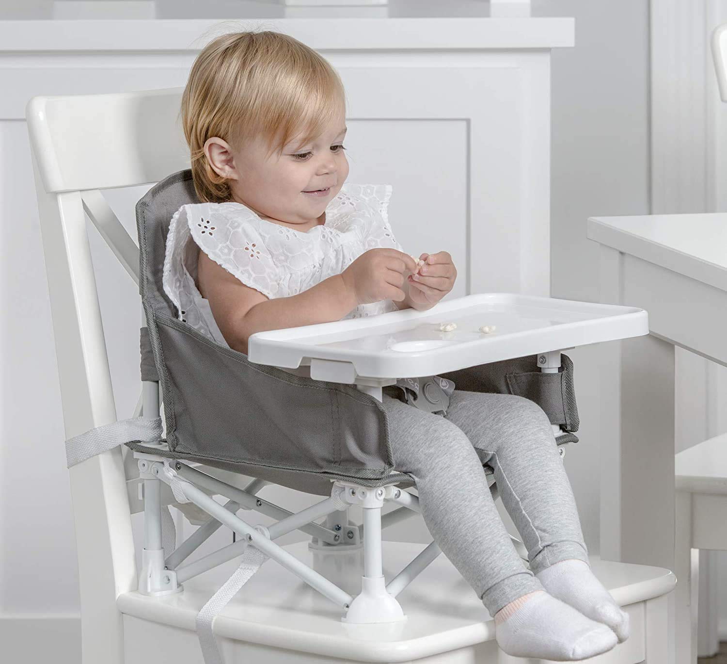 HuggleSeat - Portable high chair for home and on the go