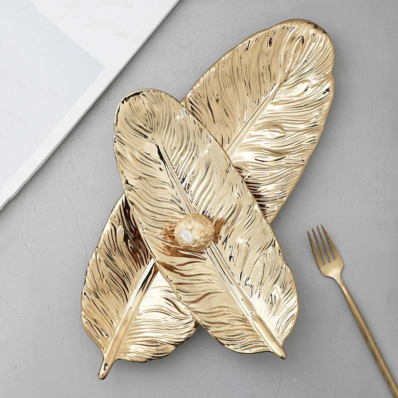Decoratief metalen serveerblad met organische bladvorm