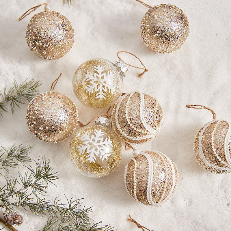 Set van 9 gouden kerstboomballen met decoratieve designs