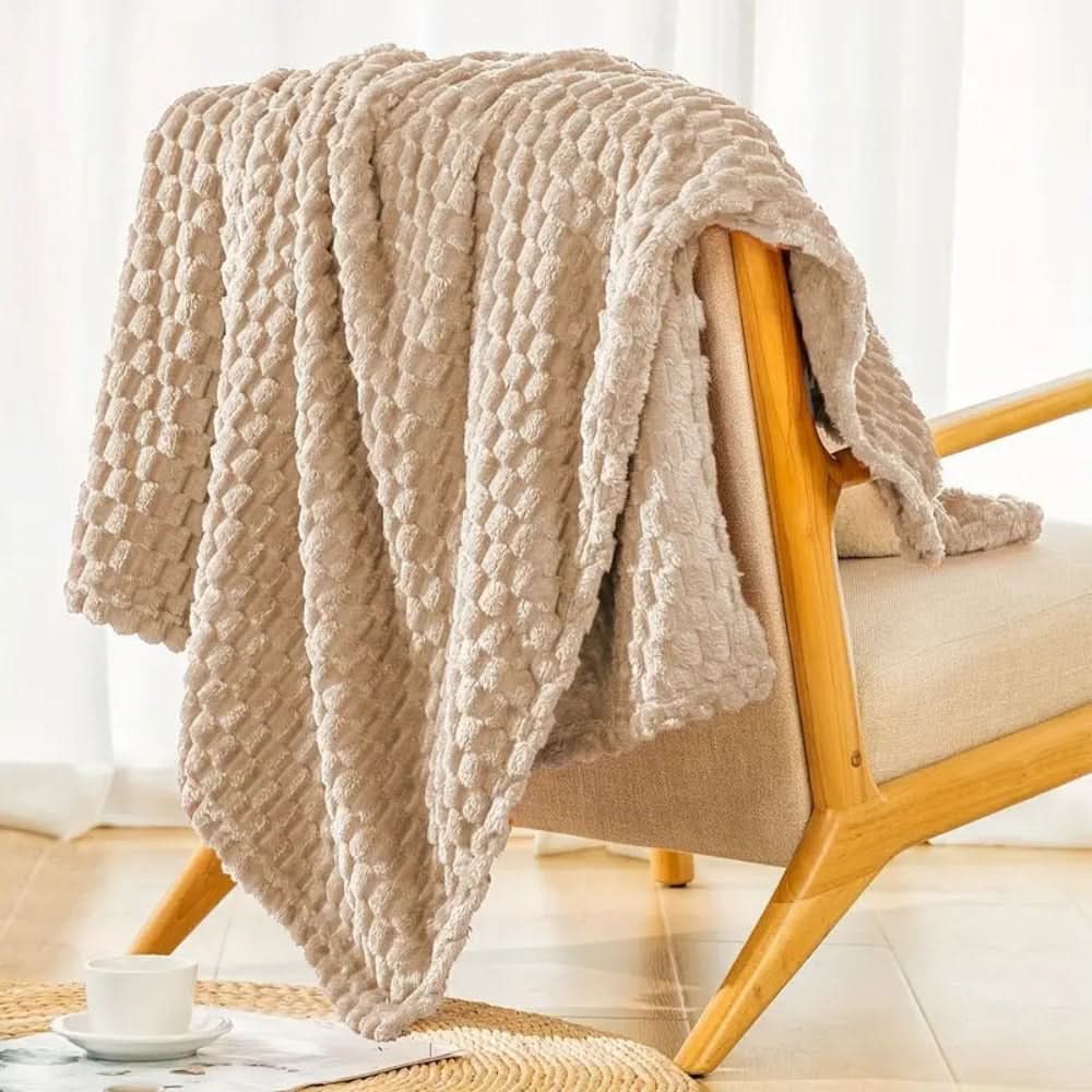 Velunaro deken uitgespreid over het bed voor extra comfort