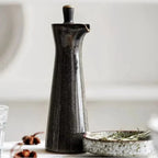 Compacte keramieken olie dispenser voor op tafel